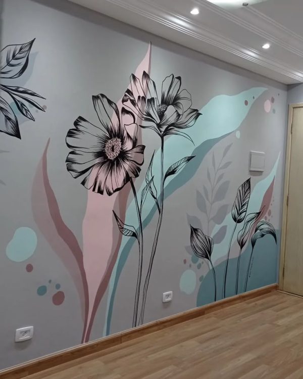 A beautifully designed floral mural on an interior wall, featuring black outline flowers with soft pastel shades of pink and blue, creating a modern and elegant aesthetic.