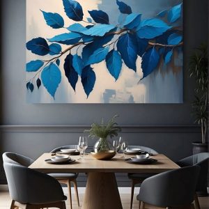 A modern dining room with a large oil painting of blue leaves on a branch, set against a textured abstract background. The space features a wooden dining table, elegant chairs, and stylish table settings.