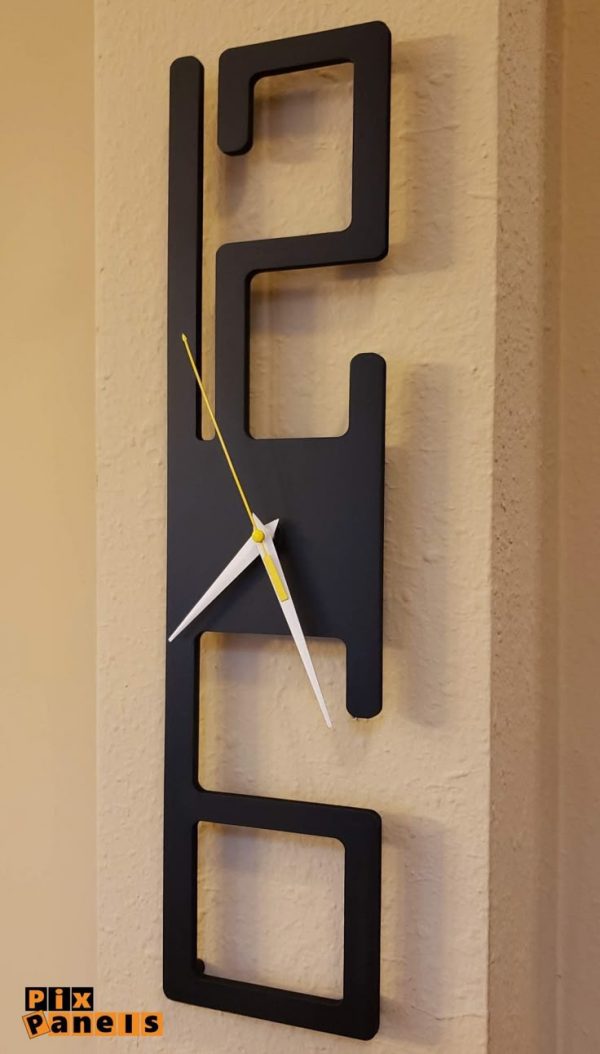 Vertical modern wall clock with artistic numbers and yellow-white hands